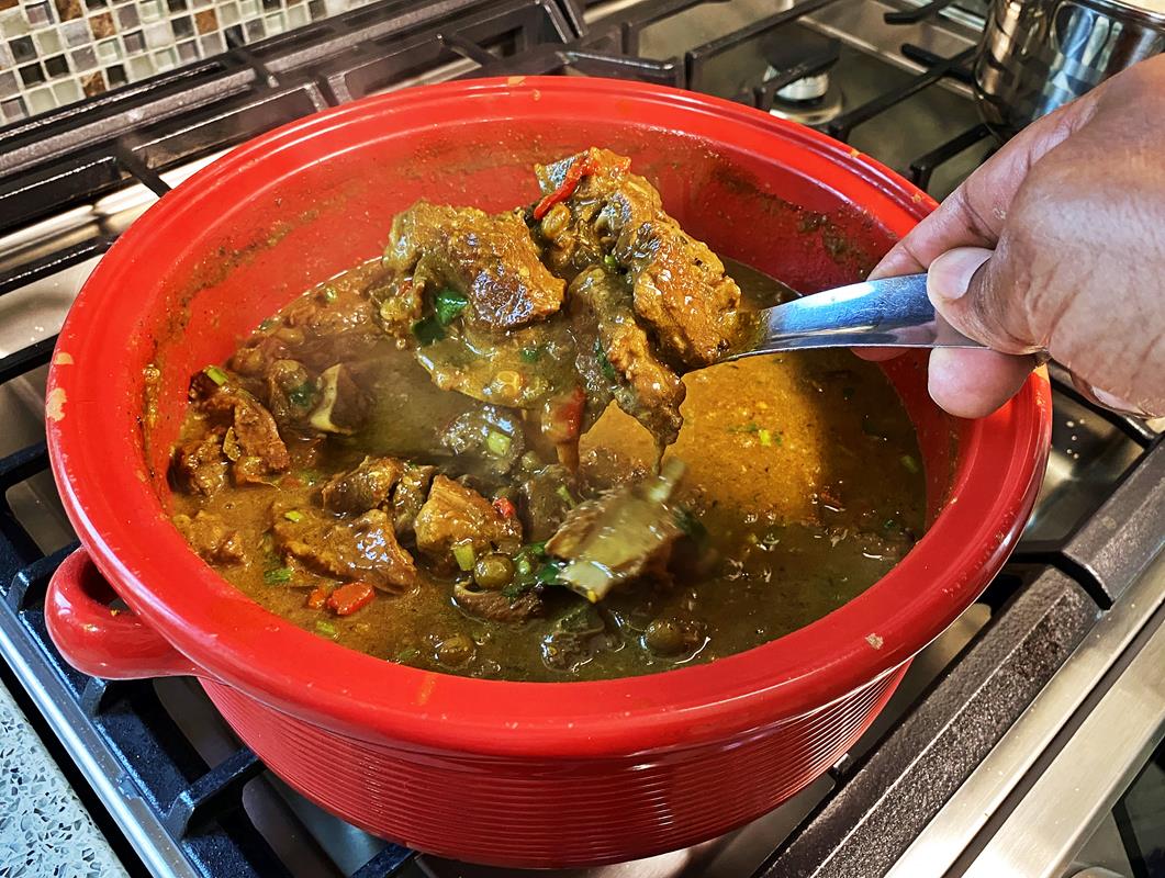 Curry Goat With Pigeon Peas.